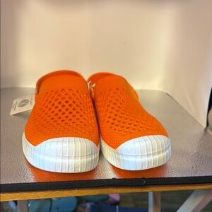 Layer 8 slip on beautiful orange women’s sneakers. Size 10.